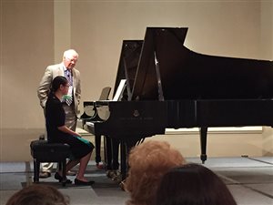 Calla Xu with composer Robert Vandall at the Texas Music Teachers Association convention
