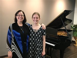 Erin Guetzloe, 1st place Bowman Winner in the Junior Tuesday Musical Club competition, works with Trinity’s Dr. Carolyn True